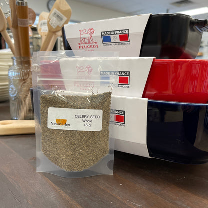Small bag of whole celery seed on a table.